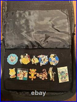 80 disney pin collection with Haunted mansion disney pin trading book